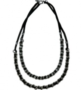 Life on the edge: let your look say it all. Vince Camuto's rock-inspired two-row necklace channels plenty of attitude with woven leather accents in a hematite tone mixed metal chain setting. Approximate length: 20 inches.