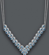 Give new meaning to a plunging neckline. This glamorous v-shaped necklace features two beautiful rows of oval-cut blue topaz (20 ct. t.w.). Set in sterling silver with a double chain design. Approximate length: 18 inches. Approximate drop width: 3 inches.