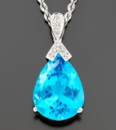 A drop of color adds interest to everything you wear. This pear-shaped pendant glistens with blue topaz (18-3/8 ct. t.w) with diamond accents set in 14k white gold. Drop measures 1 inch. Chain measures 18 inches.