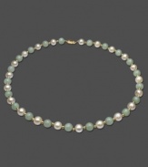 Look pretty in elegant pastels. This gorgeous necklace features cultured freshwater pearl (8 - 8-1/2 mm) and jade (8 mm) set in 14k gold. Approximate length: 18 inches.