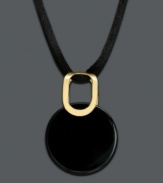 Avant-garde design lends modern flair to every day. Round onyx disc pendant (22 mm) hangs from a simple black silk cord. Clasp and setting crafted in 14k gold. Approximate length: 18 inches. Approximate drop: 1-1/4 inches.