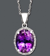 Look perfectly poised in purple. This stunning pendant features oval-cut amethyst (1-1/2 ct. t.w.) with diamond dusted edges. Crafted in 14k white gold. Approximate length: 18 inches. Approximate drop: 1/2 inch.