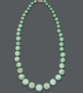 Spruce up your style in fresh, spring color. This beautiful, graduated necklace features jade beads (7-17 mm) set in 14k gold. Approximate length: 18 inches.