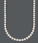 Enrich your wardrobe with a luxurious strand of pearls. This polished Belle de Mer necklace features AA+ cultured freshwater pearls (11-12 mm) with a 14k gold clasp. Approximate length: 24 inches.