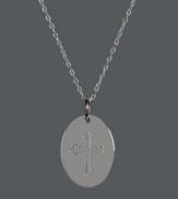 Express your sense of faith and style simultaneously! This polished, oval pendant highlights an intricate, engraved cross in sterling silver. Approximate length: 18 inches. Approximate drop: 3/4 inch.