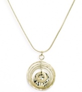 Add shimmer and shine with a perfected pendant. Nine West's chic circular style highlights graduated, cut-out discs strung from a delicate chain. Crafted in gold tone mixed metal. Approximate length: 22 inches. Approximate drop: 2 inches.