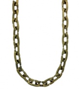 Take it back a few decades in this retro-chic style with a modern twist. Embrace the thick chain trend in Vince Camuto's Kiss necklace. Crafted in vintage brass tone mixed metal. Approximate length: 30 inches.