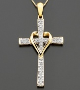 This diamond necklace with a diamond-encrusted cross (1/10 ct. t.w.) is ensconced within a gleaming gold heart. Set in 14k gold. Chain measures 16 inches.