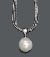 A daytime accessory or an evening statement piece. Fresh by Honora necklace features three textured sterling silver chains that stand in stark contrast to a lustrous cultured freshwater pearl (12-13 mm) pendant. Approximate length: 18 inches. Approximate drop: 3/4 inch.