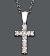 Delicate and shimmering, this diamond-accented cross pendant is perfect for your little darling. Necklace set in 14k white gold. Approximate length: 15 inches. Approximate drop: 1/2 inch.