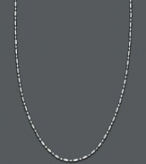 A modern alternative to a traditional chain. This necklace by Giani Bernini does the trick with a dot-dash style. Approximate length: 18 inches.