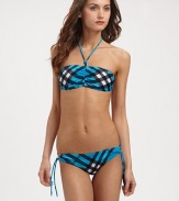 Exploded checks refresh this sexy swim style with a bust-flattering ruched center and a side-tie bottom with just the right amount of stretch. Ruched center, bandeau topHalter strap ties at neckBack clasp closureSide ties on stretch bottom80% nylon/20% elastaneHand washImported