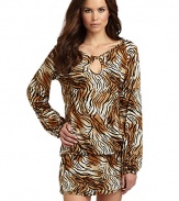 THE LOOKTiger print, alloverLong sleeves with gathered detail at cuffsFront keyhole with button closureCinched detail at hem with drawstring tie closureTHE FITAbout 36 from shoulder to hemTHE MATERIALModalCARE & ORIGINHand washImported