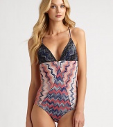 An intriguing swimsuit with an idyllic combination of contrasting prints and a head-turning neckline. Plunging necklineSelf ties at backRayon/polyesterHand washMade in Italy of imported fabric