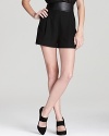 DIANE von FURSTENBERG makes these rich wool shorts extra luxurious with a supple leather waist.