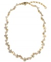 Perfectly elegant. Givenchy's crystal collar necklace sparkles in the light with its intriguing floral pattern and gold tone mixed metal setting. Approximate length: 15 inches + 2-inch extender.