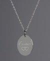 The perfect gift for your favorite mate. This oval-shaped pendant features the word Friends engraved on the surface with a double heart accent. Crafted in sterling silver. Approximate length: 18 inches. Approximate drop: 3/4 inch.