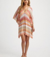 A delicately designed coverup with gorgeous colors and details.ScoopneckDolman sleevesRayonHand washMade in Italy