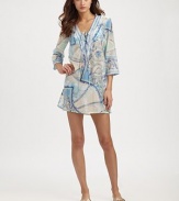 A luxurious blend of cotton and silk meets an iconic print. The lace-up neckline and side silts add an extra dose of feminine charm to this flattering coverup. V-neckThree-quarter sleevesPull-on styleSide slits68% cotton/32% silkMachine washMade in Italy