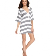 Stripe it rich with Kenneth Cole Reaction's hooded cover up – a Macy's exclusive! This sporty look works well at the beach, pool and beyond!