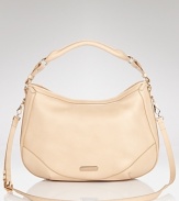 In neutral, pebbled leather, this Burberry hobo offers a versatile canvas that compliments every outfit.