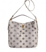 A playful polka dot print covers this lizard-embossed PVC hobo bag from Marc by Marc Jacobs - Classic hobo style, top handle and adjustable shoulder strap, magnetic top closure, roomy interior, all-over lizard embossed dot print- Perfect for your casual-cool day looks or off-duty chic