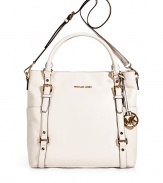 With downtown-ready styling and gold-tone hardware, this MICHAEL Michael Kors bag features ultra chic versatility - Classic tote shape, top carrying handles and a convertible shoulder strap, buckle details, side pockets, textured leather - Perfect for everyday use, off-duty cool, or stylish travel