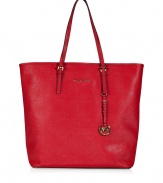 Sophisticated with simple, clean lines, MICHAEL Michael Kors textured leather tote is an elegant and versatile choice - Flat double top handles with buckle detail at base, metal logo on front, logo charm attached to handle, inside zippered back wall pocket, front wall slot pocket, cinch strap, strap with clip attached for keys - The perfect choice for work, school or running errands