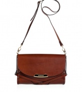 With equestrian-inspired strapping and sleek dark tan leather, Burberry Londons crossbody bag lends an ultra-sophisticated polish to your look - Flap with logo engraved plaque, removable buckled shoulder strap, check lining, inside zippered back wall pocket, front wall slot pockets - Wear with tailored outerwear or an iconic Burberry trench