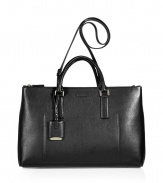 Sleek and sophisticated, Jil Sanders black convertible calfskin tote is an exquisitely chic choice perfect for streamlining modern-minimalist looks - Double top handles with engraved logo luggage tag attached, zippered front and back sectional slot pockets, expandable snapped sides, black leather interior, back wall slit pocket - An immaculate finish for all four seasons