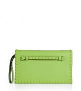 Inject a delicious dose elegance into your outfit with Valentinos apple leather tonal rockstud clutch, detailed with a front handle perfect for convertible carrying - Flap with magnetic snap closure underneath, tonal rockstud-adorned front handle, removable wristlet strap, accordion style with 2 internal sections, inside zippered back wall pocket, red interior - Carry as a polish to cocktail dresses or tailored separates