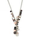 Shake it up! This colorful metallic necklace by Nine West features clusters of discs in gold tone, rose-gold tone and hematite tone mixed metal. Approximate length: 16 inches + 2-inch extender. Approximate drop: 2-1/2 inches.