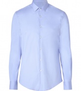 Classic button-down shirt in crisp light blue cotton - Hint of stretch creates a flattering fit - Small collar, full placket, slim long sleeves - Rounded hem - Looks great with light or navy suits at the office, or with favorite dark jeans for a polished casual look