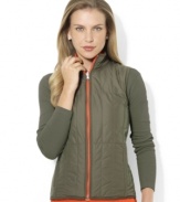 Lauren Ralph Lauren's chic quilted vest is crafted in sleek microfiber and reverses between two bold colored sides for easy athletic styling options. (Clearance)