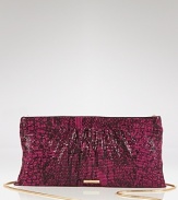 Evening style gets a touch exotic with this printed mesh clutch from BCBG Max Azria. In a bold hue, it's as striking as it is party-ready.