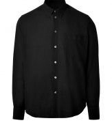 Stylish, black cotton button-down - Classic straight cut with contrasting collar buttons - Longer back than front - Features button detail on upper sleeves - Elegant enough for the office but easily dressed down when paired with jeans and boots