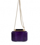 Hard-edge elegance gets an impossibly luxe twist in Diane von Furstenbergs petite clutch, finished to perfection in flawless purple snakeskin - Metal frame, hinged top closure, removable chain-link shoulder-strap, inside back wall slot pocket - Pair with cocktail dresses and statement pumps