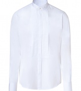 Elegant dress shirt in fine, pure white cotton - A chic twist on the classic button down - Wing collar and long, cuffed sleeves - Pleated shirt front with covered button placket - Hem hangs slightly longer in the back - Slim, straight cut - Polished and versatile, a stylish must in any wardrobe - Pair with suit trousers and a blazer or tuxedo jacket