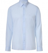 Polished, streamlined staples anchor any wardrobe, and Hugos light blue cotton dress shirt should be considered a must - Classically slim, straight cut - Small collar, full button placket and long, cuffed sleeves - Decorative seams, hem hangs slightly longer in the back - Versatile and elegant, the perfect compliment to suit trousers and a blazer or an easy way to dress up jeans and a leather jacket