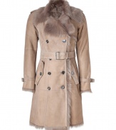 Luxury and warmth come together in this camel-colored shearling coat - Designed in lamb leather with a narrow trench silhouette, double-button closures and belted waistline - Features a large fur collar -  A fashionable lifetime investment for feminine winter looks - Wear with everything from jeans to cocktail dresses