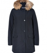 Stylish and sporty with an ultra soft raccoon fur trimmed hood, Woolrichs Arctic down parka is a must for cool weather looks - Hood with raccoon fur trim, long sleeves, fitted ribbed knit cuffs, hidden two-way front zip, button placket, buttoned front patch pockets, snapped slit pockets - Contemporary fit, slight A-line silhouette - A versatile, classic coat perfect for both city streets and country slopes