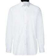 Sleek and sophisticated, Burberry Londons crisp white shirt is a chic choice no matter how you wear it - Classic collar, long sleeves, buttoned cuffs, button-down front, shirttail hemline - Classic fit - Wear with everything from jeans and pullovers to tailored suits and ties