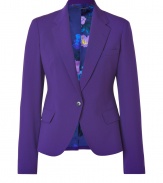 A structured blazer adds a touch of tailored chic to any wardrobe, and this purple jacket from Paul Smith positively pops - Slim, feminine cut tapers through waist - Small collar and medium width lapels - Elegant, single button closure and two flap pockets - Vent at rear - Lush, floral print lining in rich shades of violet and blue - Seamlessly transitions from work to evening cocktails, parties and dinners - Pair with leather pants or pencil skirts, skinny dark denim or suit trousers