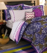 These Samara Batik decorative pillows from Teen Vogue wow you with artistic zigzags and perfect petals in pretty purple hues for a whimsical look.