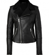 Warm and fashionable leather jacket is a must-have for the season - Designed in waxed lambskin in classic moto style - Features deep lapel with asymmetric zip, zipped side pockets, and shearling lining - Raw waisted, feminine cut with long, slim zipped sleeves and decorative stitching at the elbow - Wear with skinny pants and stilettos for a night out, or with a knit dress and booties