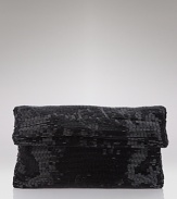 Finish your evening look with this beaded fold-over clutch from Le Regale.