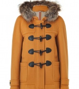 Taking inspiration from the classic toggle duffle coat, this modern take from Burberry Brit features a slim fit and a removable hood of extra versatility- Removable fur hood, concealed front button placket with toggle button closure, long sleeves with belted cuffs, slit pockets and large patch pockets, back vent - Style with slim jeans or corduroys and high heel booties