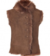 Achieve the trend-right layered luxe look in this sumptuous lambskin vest from Joseph - Fur collar, sleeveless, front button placket, fur-trimmed front and hem, fur inside - Fitted - Wear with a bohemian-inspired blouse or dress, a fringed scarf, and over-the-knee boots