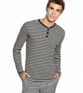 From the high seas to the city streets. Get hip to the nautical trend with this sporty striped henley from Sons of Intrigue.