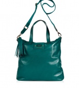 Elevate your everyday or off-duty look with this supple leather tote from cult-favorite accessory designer Anya Hindmarch - Large carryall shape, top zip closure with tassel detail, top carrying handles, convertible shoulder strap, small internal pockets, back zip pocket - Perfect for toting around your daily essentials, work, or stylish travel